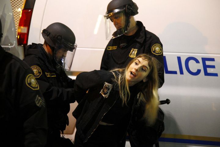 <strong>Police detain a demonstrator during the anti-Trump rally in Portland</strong>