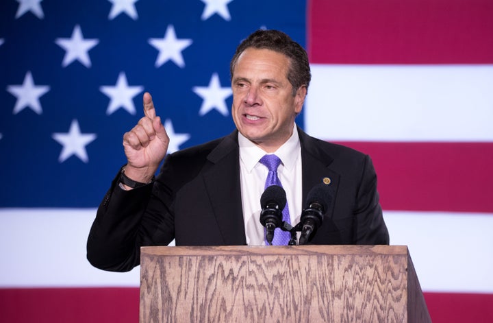 New York Gov. Andrew Cuomo (D) speaks at Hillary Clinton's election night party in New York City. After Donald Trump's victory, he is pledging that New York will be as progressive as ever.