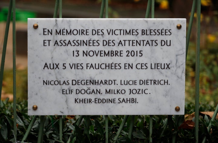 A commemorative plaque unveiled by Hollande and Hidalgo is seen next to the A La Bonne Biere cafe in Paris.