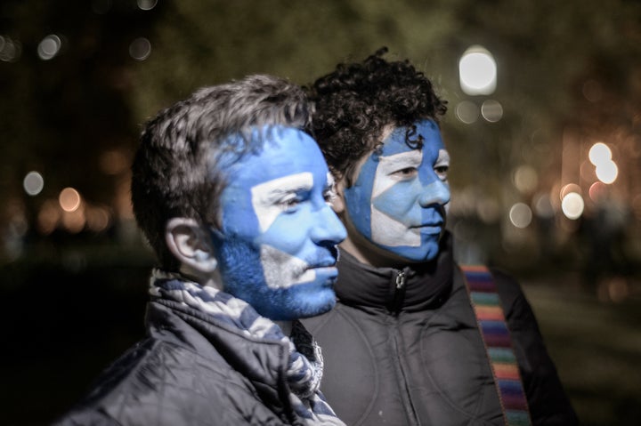 Two men waiting for a Hillary party that never happened in front of the White House.