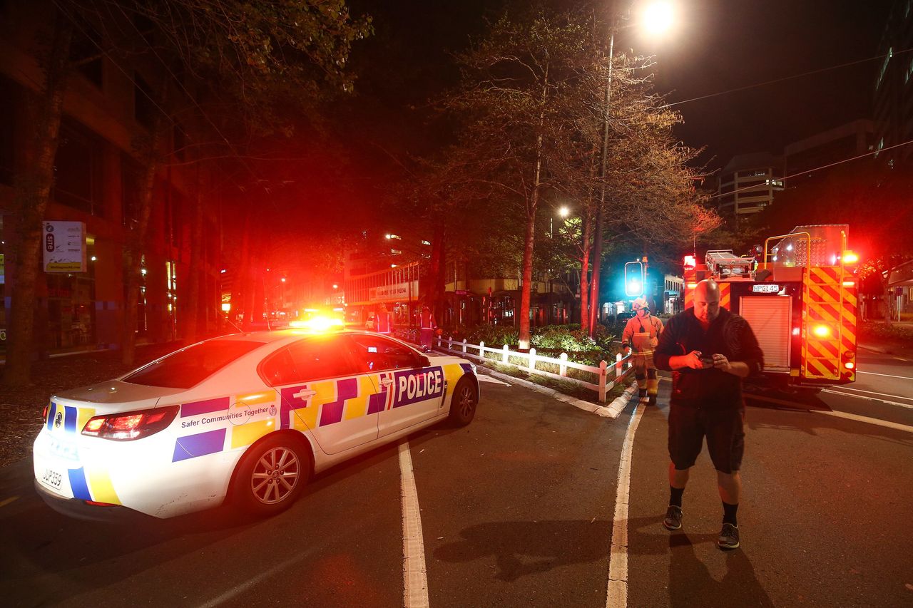 <strong>Police and the Fire Service block the corner of Wakefield and Victoria Streets after an earthquake in Wellington, New Zealand.</strong>