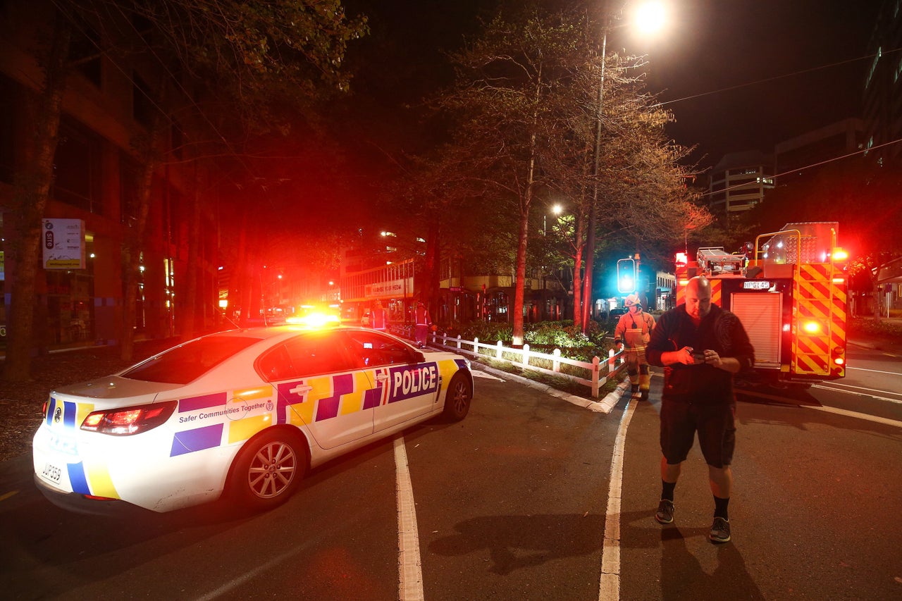 Police and the Fire Service block the corner of Wakefield and Victoria Streets after an earthquake in Wellington, New Zealand.