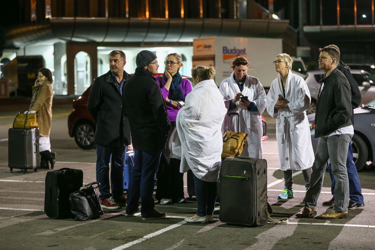 Amora Hotel guests gather in a carpark after an earthquake in Wellington.