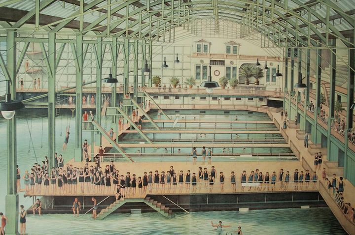 <p>San Franciscans swimming in the indoor pools at Sutro Baths </p>