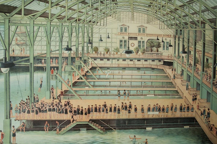 San Franciscans swimming in the indoor pools at Sutro Baths 