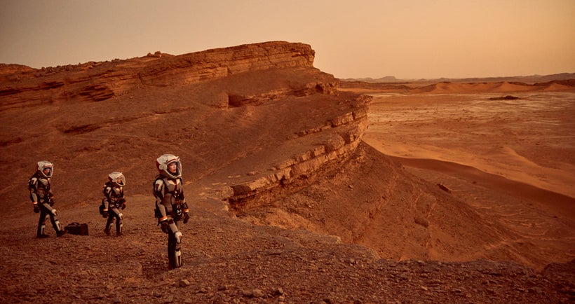 Some of the crew exploring Mars.