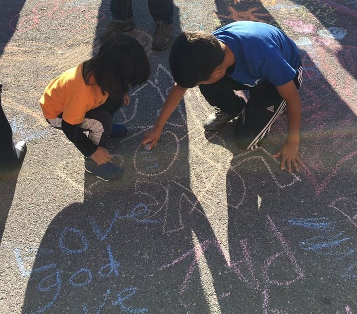 Members of the Episcopal Church of Our Saviour in Silver Spring, Maryland, responded to racist graffiti with chalk messages promoting love and unity on Sunday.