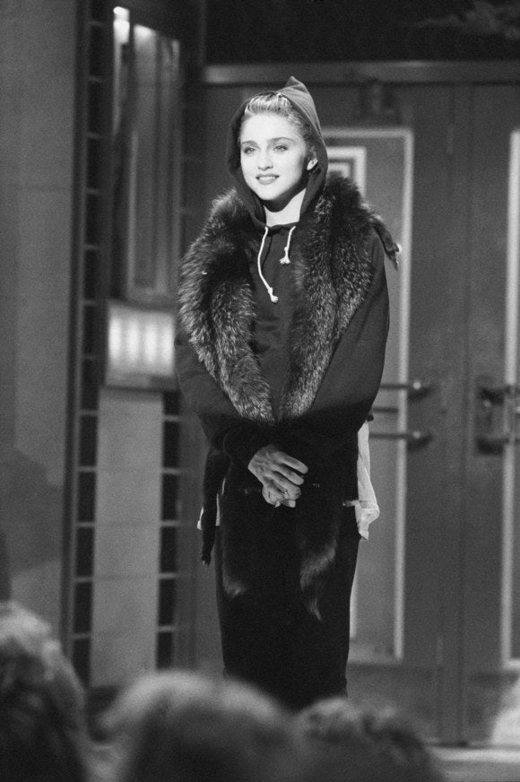 Madonna wearing a hoodie on the set ofSaturday Night Live in 1985.