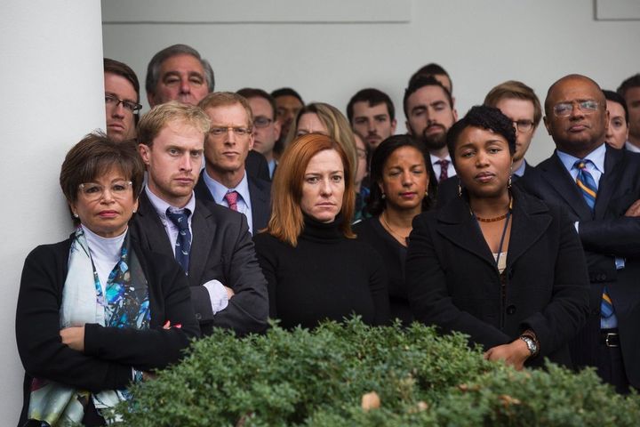 White house staff look on as President Obama responds to the 2016 election results