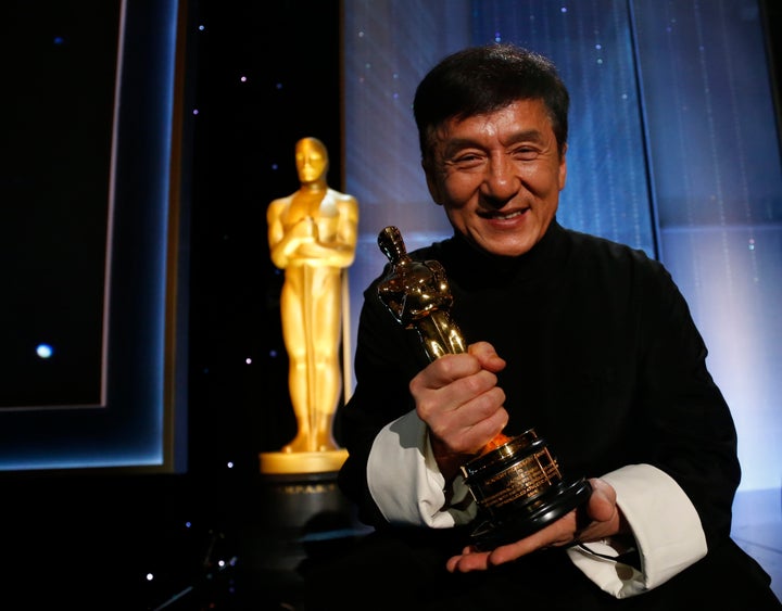 Jackie Chan with his award. 