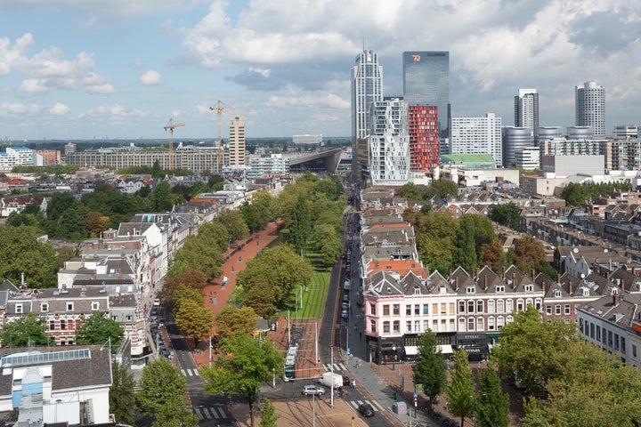 Westersingel greenway stretching toward Rotterdam's Central Station.