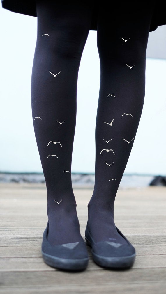Flock of Birds tights, $23 at <a href="https://www.etsy.com/listing/200432183/tattoo-tights-flock-of-birds-print-gold?ga_order=most_relevant&ga_search_type=all&ga_view_type=gallery&ga_search_query=tattoo%20tights&ref=sc_gallery_2&plkey=024034d3015944a0f54e74932a84b2cb292e56a9:200432183" target="_blank">etsy.com/shop/emteesee</a>