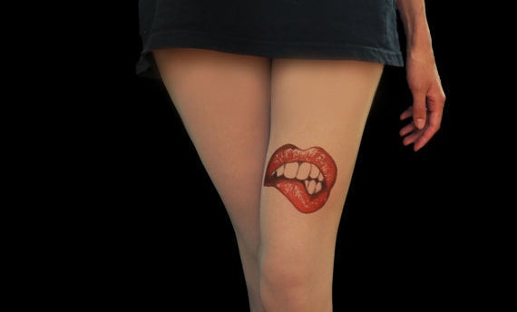 Lips tattoo tights, $27.55 at <a href="https://www.etsy.com/listing/456149844/lips-tattoo-tights-hand-painted?ref=shop_home_active_56" target="_blank">etsy.com/shop/TattooTightsTATUL</a>