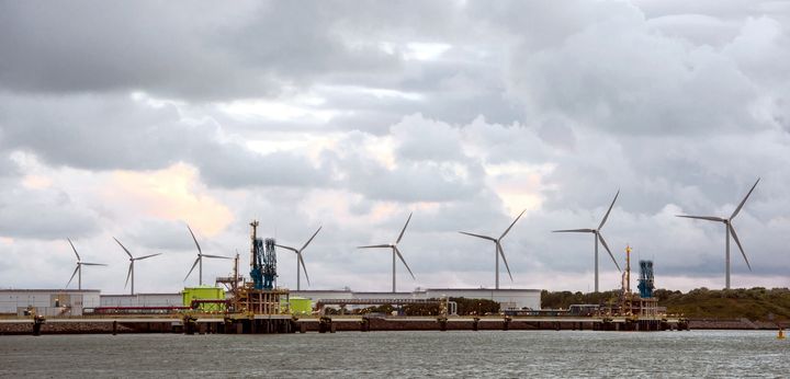 <p><strong><em>Wind turbines behind gates of LNG Terminal at Maastvlatke, Port of Rotterdam.</em></strong></p>