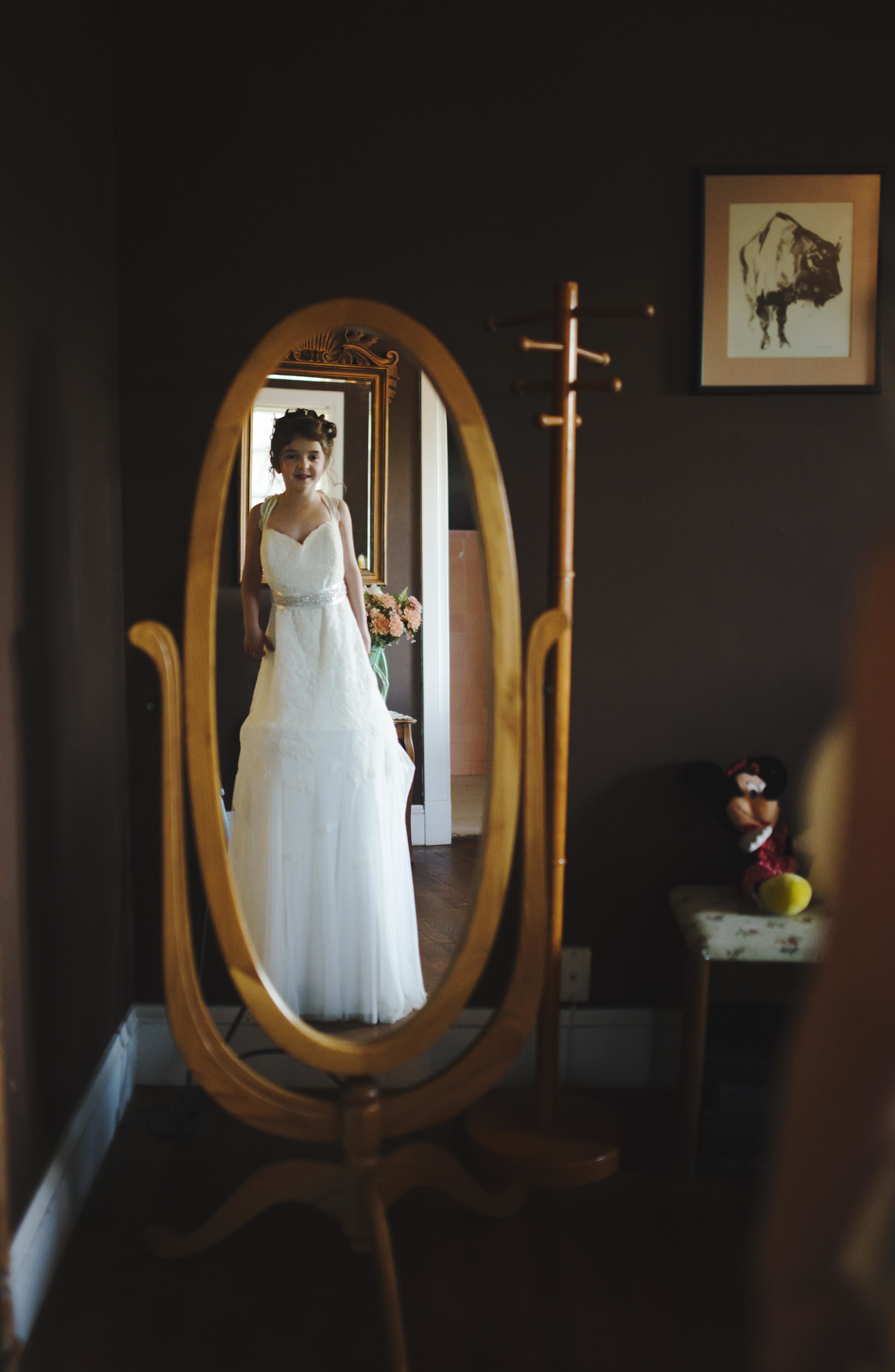 daughter in mom's wedding dress