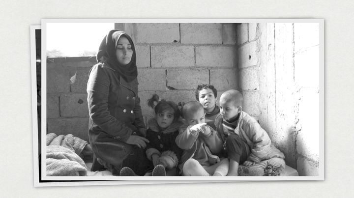 Rana and her children in their home outside of Damascus, Syria.
