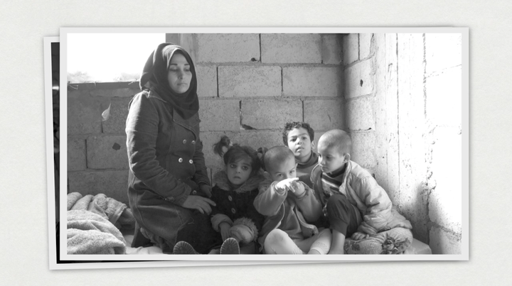 Rana and her children in their home outside of Damascus, Syria.