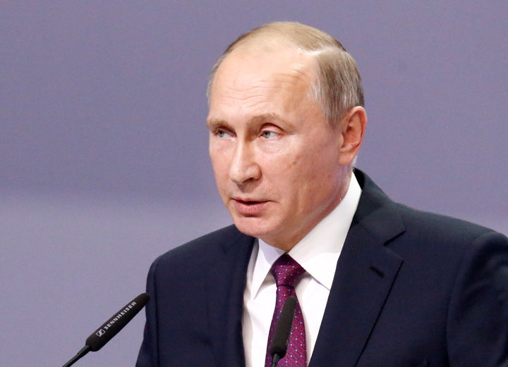Russian President Vladimir Putin delivers a speech during an international conference dedicated to the 175th anniversary of S