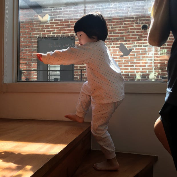 <p><em>Little Miss Cautious taking to the steps independently during our recent family holiday to Korea. She refused to hold my hand, and surprised me with that go-getter attitude!</em> What joy!</p>