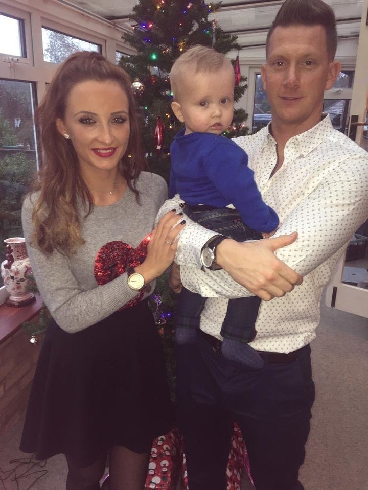 <strong>Mark Smith with his partner Indre Novikovaite and their son</strong>