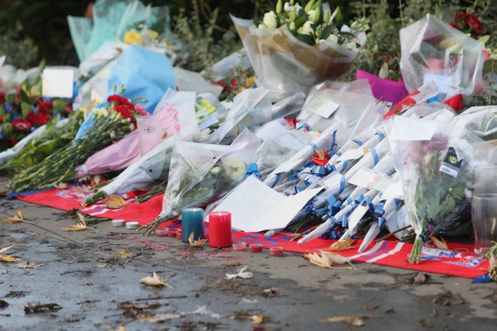<strong>Floral tributes are being left at the scene </strong>