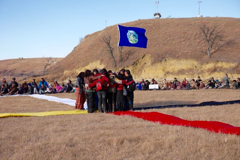 Youth Council organized this human medicine wheel. Shots from drones will show “Water Is Life” forms. Watch for photos to be