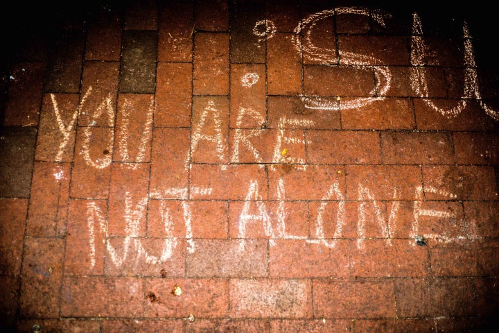 A message scribbled in chalk expresses support for Muslims at the University of Michigan.