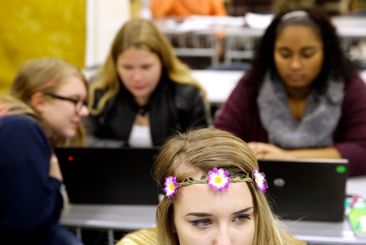 Kirsten Delauney, with flowers in her hair, participates in the StoryCorps oral history project at Washington County Technical High School in Maryland in 2015.