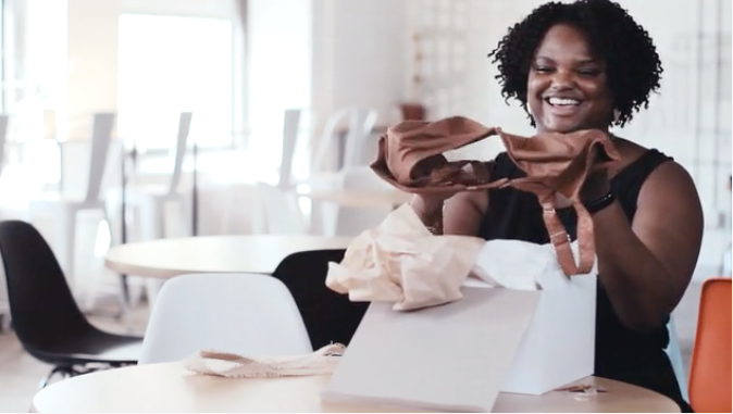 One of the women seeing her TruNude bra for the first time.