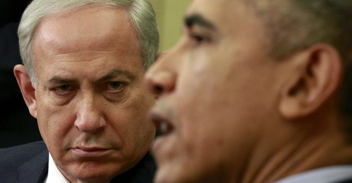 Netanyahu listens to Obama during a meeting at the White House on Nov. 9, 2015.