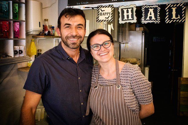 Mike, originally from Syria, is seen with his partner Carmen. His cafe, called Zig Zag, in Epsom, near London, has become the social hub of Refugees at Home, a local initiative that places asylum seekers in the homes of Londoners offering their spare rooms.