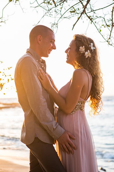 Tousled waves complement a dreamy seaside ceremony. Use a salt spray to achieve the desired piece-y texture.