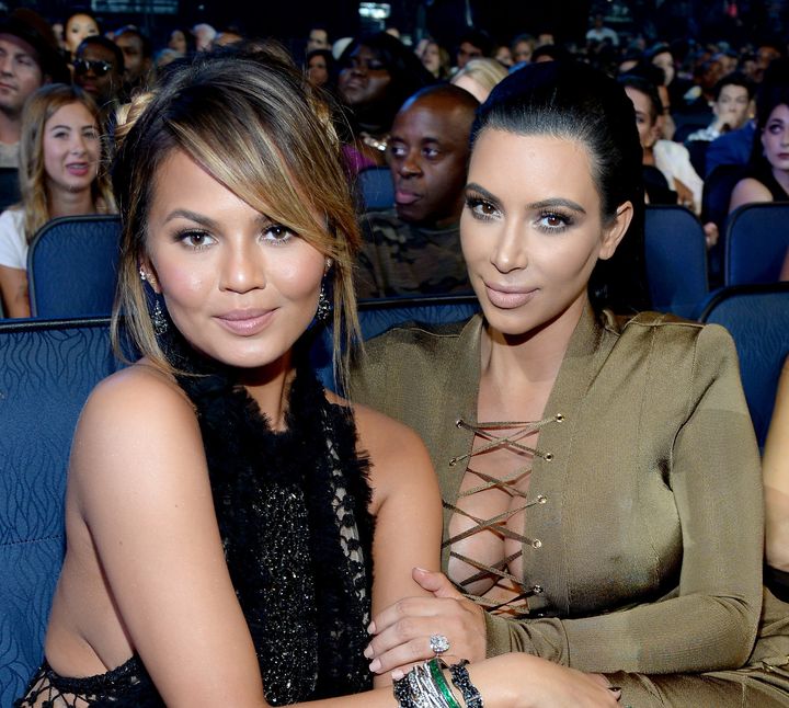 Teigen and Kardashian at the 2015 MTV VMAs on Aug. 30, 2015. 