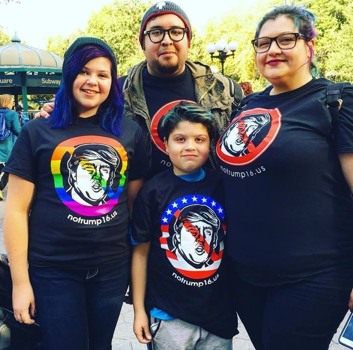 At Union Square in Lower Manhattan, a family wears original, flag, and pride versions of the NoTrump16 shirt. 