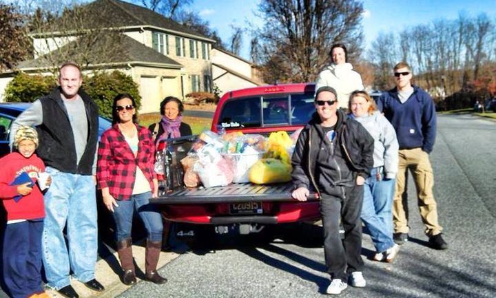 Kyle McMahon (third from right, in black) along with some of the Delaware Basket Brigade volunteers before a delivery. Pictured from right: George Williams, Kim O’Neill, Megan Cavanaugh, Barbara Flowers, Jennifer Costa, Michael and Aiden Tobiason.