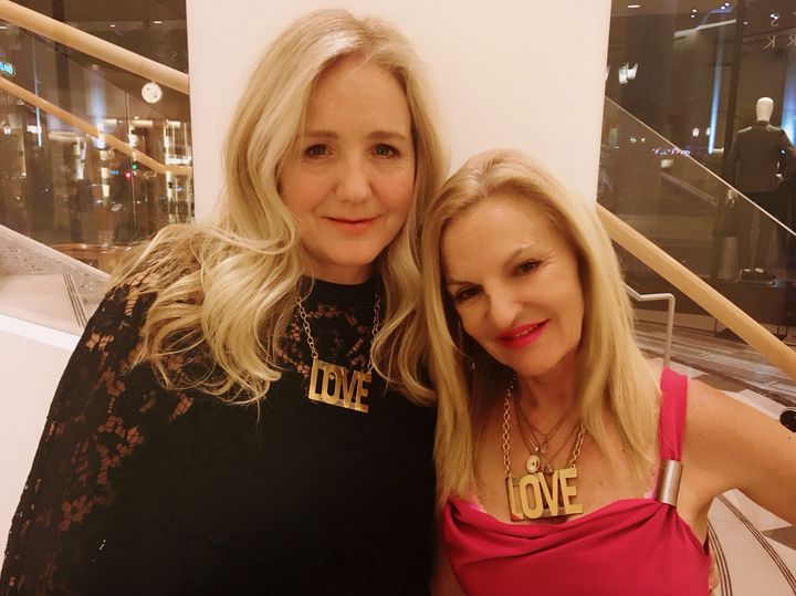 Laura Kimpton and Lita Barrie wearing LOVE necklaces at the Venetian.