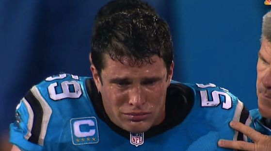 Luke Kuechly of the Carolina Panthers sobs after being injured Thursday. Medical officials have examined him for suspected concussion.