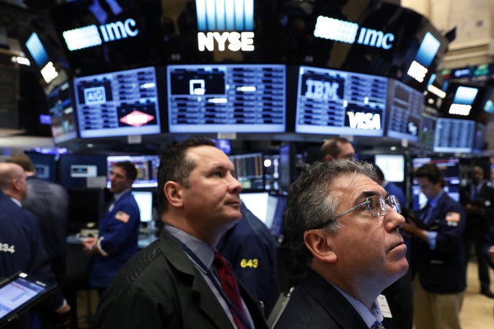 Traders work on the floor of the New York Stock Exchange (NYSE) shortly after the opening bell in New York City, NY, U.S. Nov