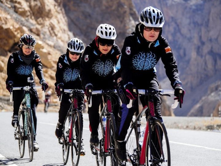 The young women on Afghanistan's national women's cycling team have to put up with harassment and even physical assault from men who believe it's dishonorable for a woman to ride a bike.