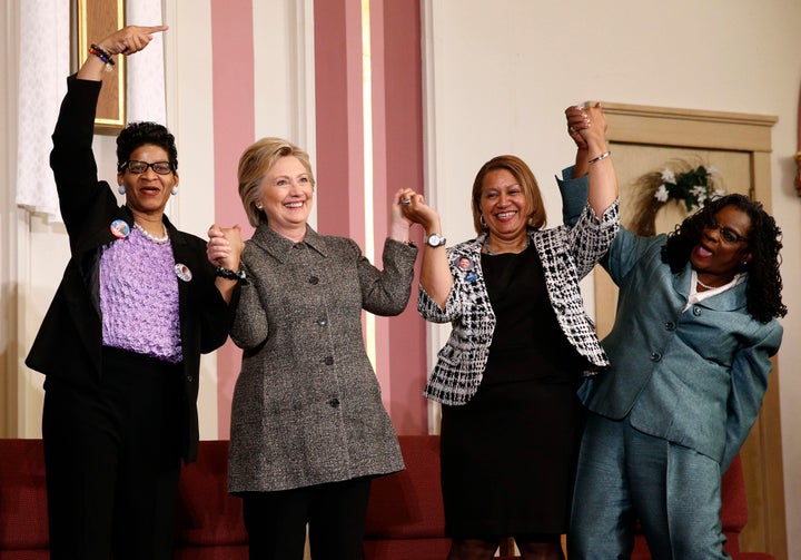 Former Democratic presidential nominee Hillary Clinton stands with (from left) Geneva Reed-Veal, Annette Holt and Rep. Gwen Moore after attending a forum on gun violence.