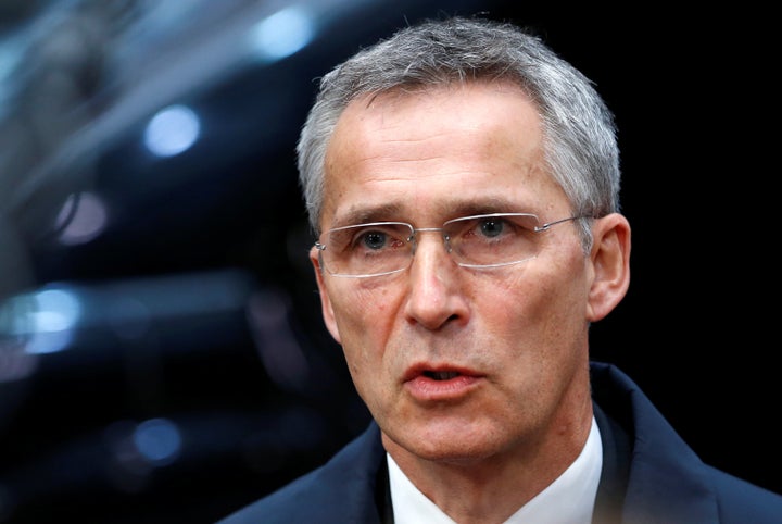 NATO Secretary-General Jens Stoltenberg briefs the media as he arrives at a European defence ministers meeting in Brussels, B