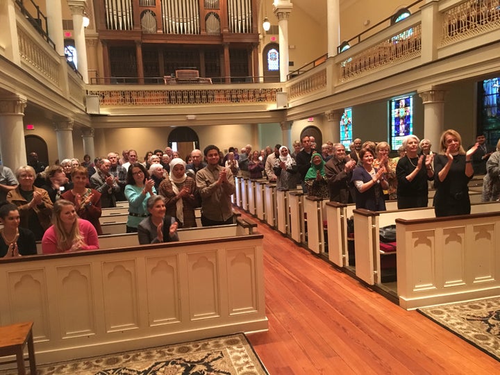 A diverse audience at St. George’s Episcopal Church gives Ahmed a standing ovation following his lecture on interfaith bridge building in a time of great uncertainty.