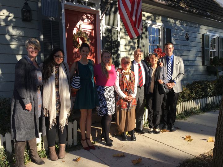 <p>Ahmed gathers with his team, including author Patrick Burnett (far-right), and gracious hosts in front of the home of The Rev. Ed Jones and his wife, Peggy Jones, following a luncheon hosted by the Joneses in Ahmed’s honor.</p>