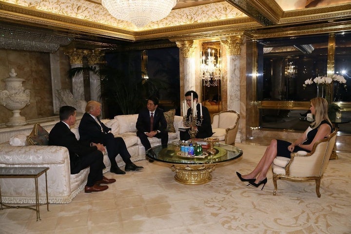 Daughter Ivanka Trump joins in a meeting between President-elect Donald Trump and Japanese Prime Minister Shinzo Abe, center, at Trump Tower.