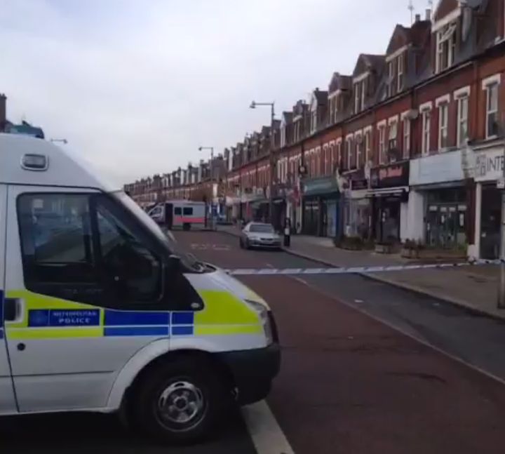 Heath Road in Twickenham is in lockdown after a man began throwing bricks at police from a roof