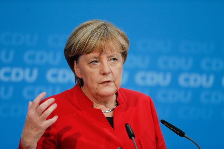 German Chancellor Angela Merkel addresses a news conference, to announce that she will run again for the Chancellorship.