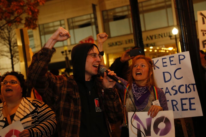 Members of DC Antifascist Coalition protest outside the National Policy Institute event in Washington