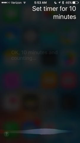 Setting a timer using Siri on an iPhone.