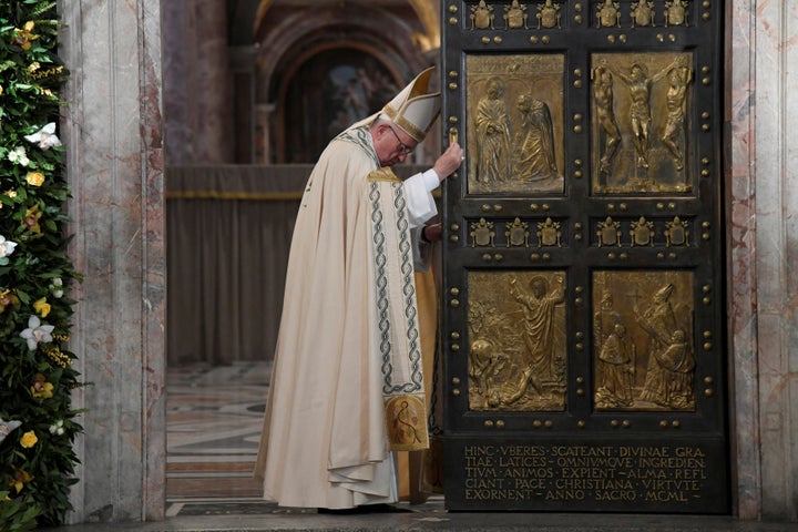 Pope Francis closes the Holy Door to mark the closing of the Catholic Jubilee year of mercy at the in Saint Peter's Basilica at the Vatican November 20, 2016.