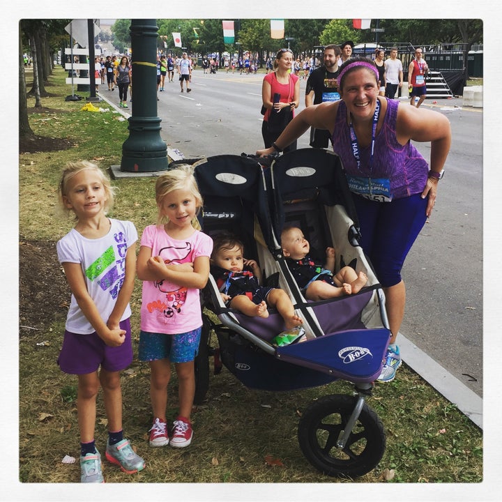 Emily with her family after competing in the Philadelphia Half Marathon in September.